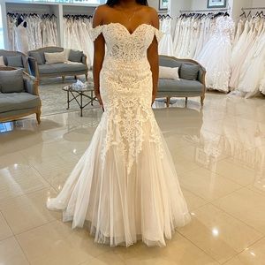 Brand New Wedding Dress. Never Worn. Comes in dress bag